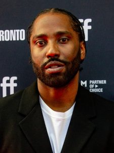 John David Washington som Harold Woodman