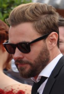 Patrick John Flueger som Adam Ruzek